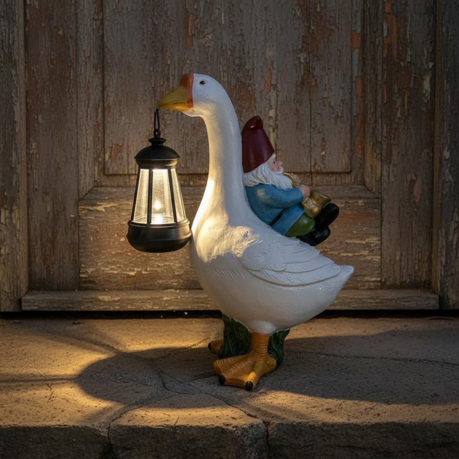 Outdoor Lighting Traditional - تمثال جنوم يركب الإوزة، مصباح شمسي